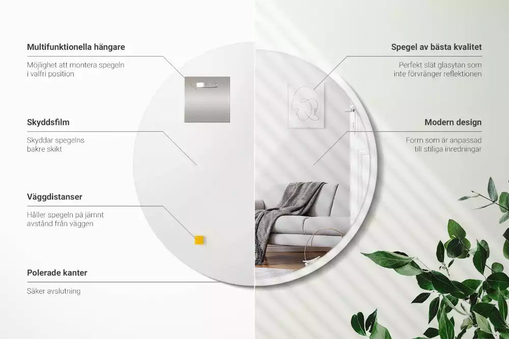 Oglindă rotundă atârnată într-un cadru alb